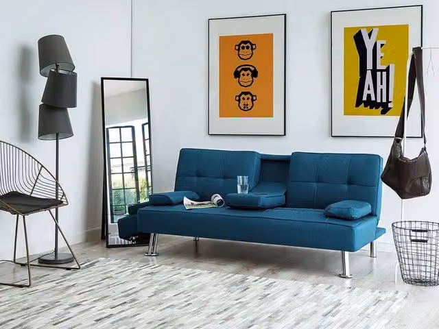 Divano letto Click Clack Beliani blu a 3 posti con poggiatesta regolabile e coperture rimovibili