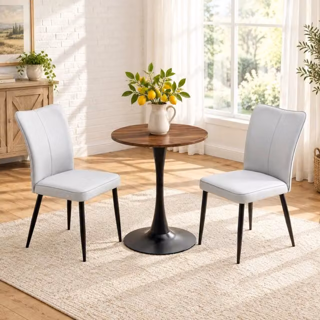 Set tavolo e sedie MIVRAY da 3 pezzi con tavolo rotondo in MDF e 2 sedie in similpelle grigio chiaro e metallo nero, L: 120 cm, H: 72 cm