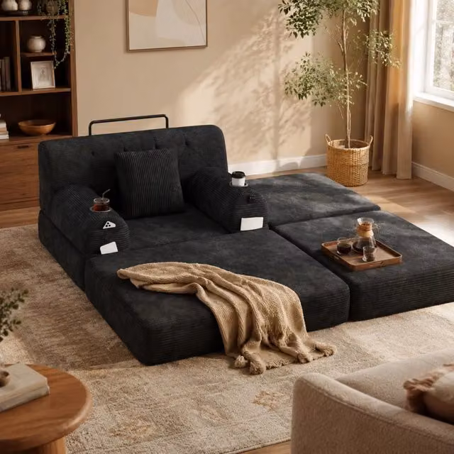 Poltrona letto singola Mivray in velluto a coste nero con poggiapiedi, schienale alto, tasche e portabevande L/P/H: 81 x 162 x 107 cm