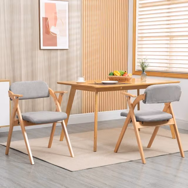Set di 2 sedie pieghevoli FOLYNA in legno di faggio grigio con braccioli, seduta imbottita in tessuto e design impilabile scandinavo