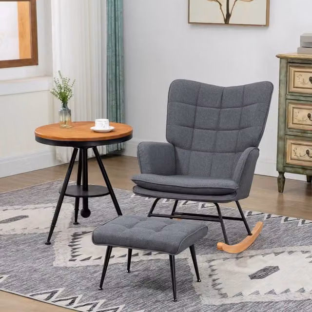 Poltrona a dondolo con pouf OKWISH in tessuto grigio con schienale alto imbottito e base in legno di faggio, L: 64 cm, P: 89 cm, H: 90 cm