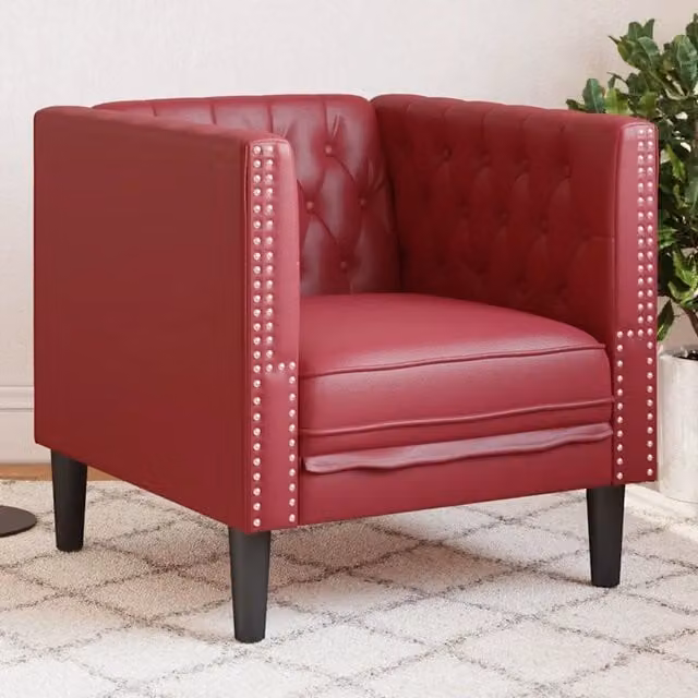 Poltrona Chesterfield in similpelle rossa con braccioli e struttura in legno