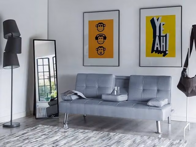 Divano letto Beliani a 3 posti moderno in tessuto grigio con funzione click-clack e poggiatesta regolabile